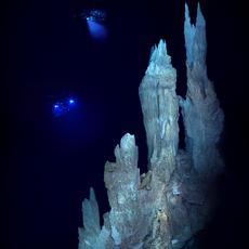 “Nature Tower”, a 30 metre-high limestone chimney of Lost City illuminated by underwater robots. (Photo: Deborah Kelley and Mitch Elend, University of Washington, Institute for Exploration, URI-IAO, NOAA, and the Lost City science team)