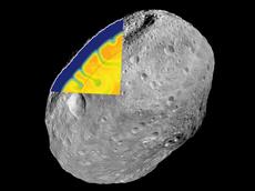 A black-and-white mosaic image of Vesta taken from NASA’s Dawn spacecraft, superimposed with an image from a numerical simulation of Vesta’s thermal evolution within its first 50 million years. It shows a dynamic interior with solidified material sinking into an underlying partially molten mantle. Credit: F.E. Brenker, NASA DAWN and G.J. Golabek